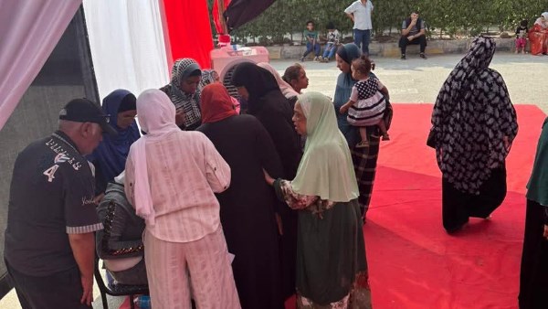 الناس بتتوافد على حدائق أكتوبر علشان ينتخبوا في انتخابات مجلس النواب